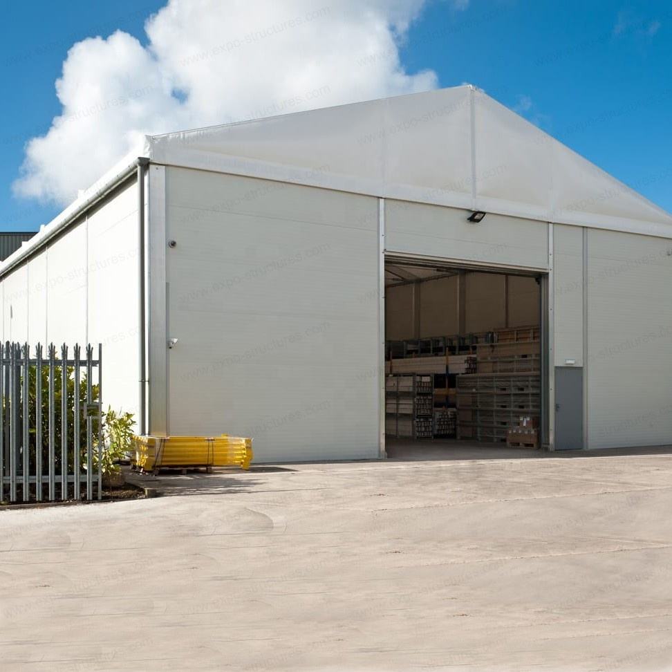 Tienda de almacenamiento de almacén Industrial grande, PVC a prueba de rayos UV, impermeable, sándwich ignífugo, hojas de acero duraderas, logotipo de tela para uso en exteriores