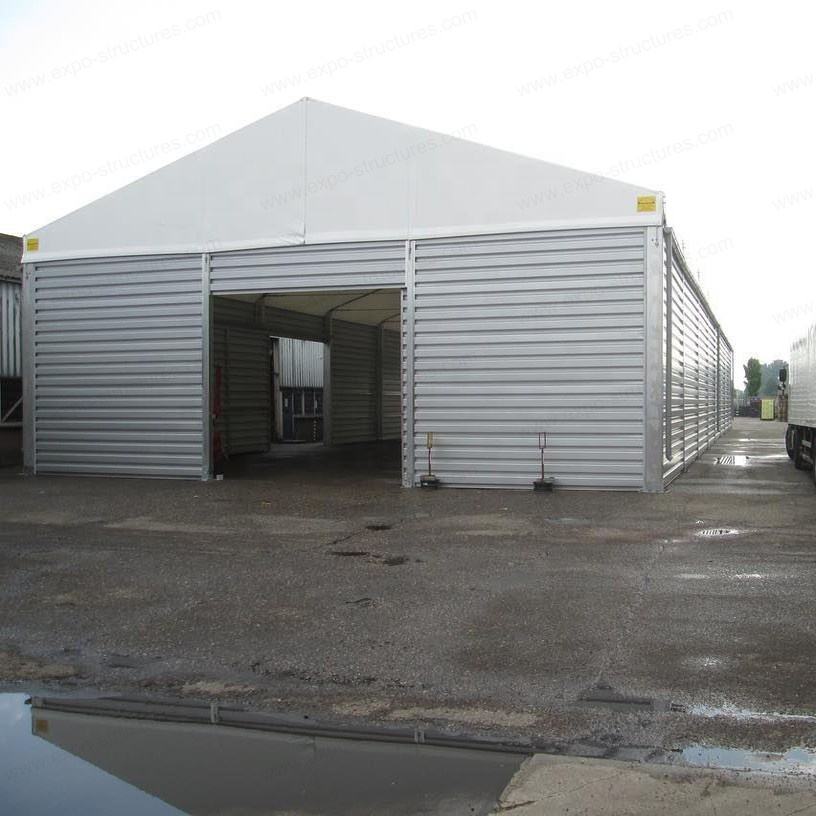 Tienda de almacenamiento de almacén Industrial grande, PVC a prueba de rayos UV, impermeable, sándwich ignífugo, hojas de acero duraderas, logotipo de tela para uso en exteriores